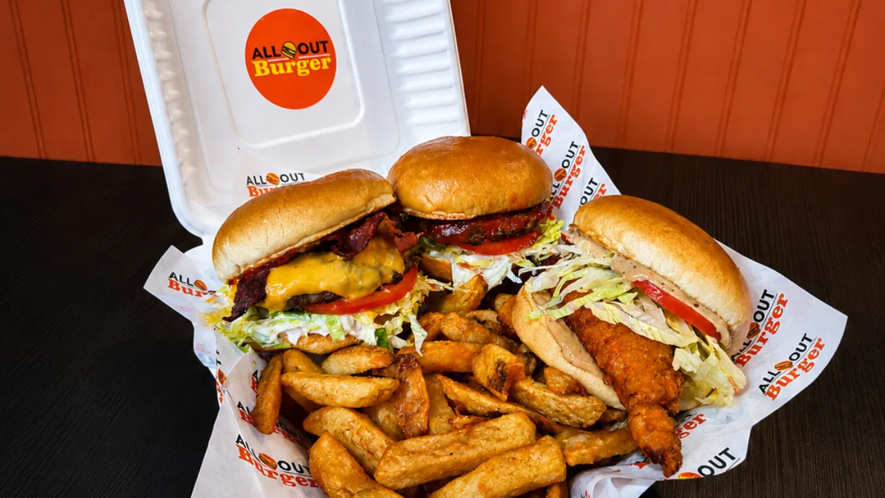 All-Out Burger burgers, chicken sandwich and fries in branded packaging